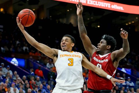 Tennessee Volunteers guard James Daniel III (3) drives in for a layup attempt as he is pressured by Arkansas Razorbacks guard Jaylen Barford (0) during the first half of the semifinals of the SEC Conference Tournament at Scottrade Center. (Billy Hurst-USA TODAY Sports)