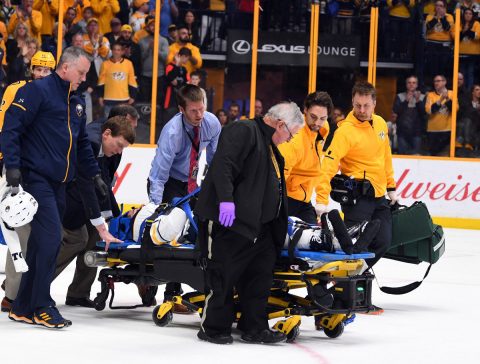 Buffalo Sabres defenseman Viktor Antipin (93) is taken off the ice on a stretcher after being hit into the boards by Nashville Predators left wing Scott Hartnell (not pictured) during the second period at Bridgestone Arena. (Christopher Hanewinckel-USA TODAY Sports)