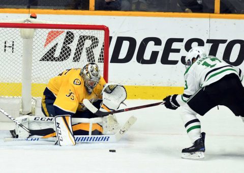  Nashville Predators goalie Pekka Rinne (35) stops a shot by Dallas Stars center Mattias Janmark (13) during the third period at Bridgestone Arena. (Christopher Hanewinckel-USA TODAY Sports)