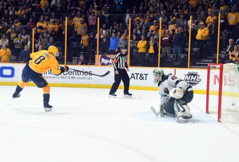 Nashville Predators center Kyle Turris (8) scores in the shootout against Minnesota Wild goalie Devan Dubnyk (40) at Bridgestone Arena. (Christopher Hanewinckel-USA TODAY Sports)