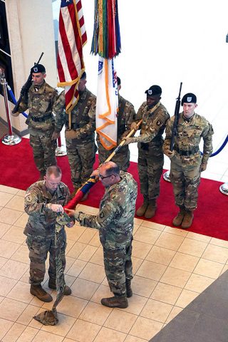 Maj. Gen. Andrew Poppas, 101st Airborne Division (Air Assault) commander and Command Sgt. Maj. Todd Sims, 101st Abn. Div. senior enlisted leader, case the division headquarters’ colors, April 3, at McAuliffe Hall, in advance of the unit’s deployment, its fourth to Afghanistan in the last decade. (Sgt. 1st Class Christopher Roberts, 101st Airborne Division (Air Assault) Public Affairs)