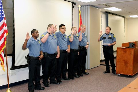 Richard Byers, Travis Roberts, Jeffrey Siu, Emmanuel Vaughn, and Daniel Williams sworn in by Montgomery County Sheriff John Fuson.