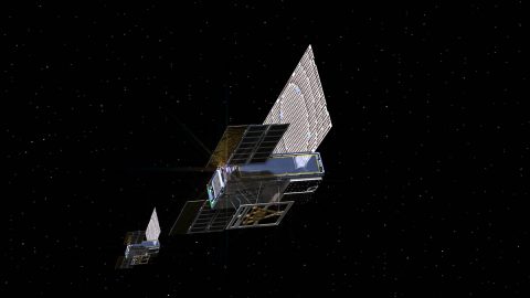 An artist's rendering of the twin Mars Cube One (MarCO) spacecraft as they fly through deep space. The MarCOs will be the first CubeSats -- a kind of modular, mini-satellite -- attempting to fly to another planet. (NASA/JPL-Caltech)