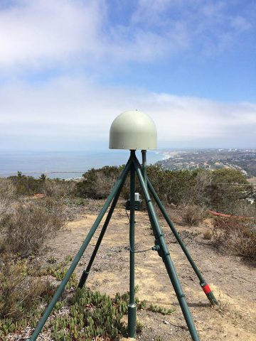 Thirty-seven GPS stations like this one on Mt. Soledad in San Diego have been added to the National Oceanic and Atmospheric Administration’s meteorological GPS network in Southern California. Meanwhile, the Scripps Institution of Oceanography is outfitting the stations with accelerometers to enable early warning of earthquakes. (D. Glen Offield, Scripps Institution of Oceanography)