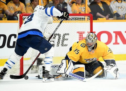 Winnipeg Jets left wing Brandon Tanev (13) scores against Nashville Predators goalie Pekka Rinne (35) during the first period in game one of the second round of the 2018 Stanley Cup Playoffs at Bridgestone Arena. (Christopher Hanewinckel-USA TODAY Sports)