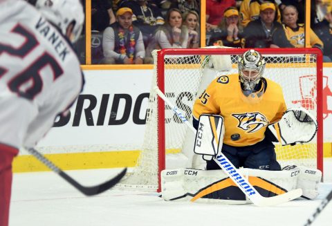 Nashville Predators goalie Pekka Rinne (35) makes a save on a shot by Columbus Blue Jackets left wing Thomas Vanek (26) during the first period at Bridgestone Arena. (Christopher Hanewinckel-USA TODAY Sports)