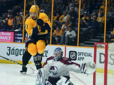 Apr 14, 2018; Nashville, TN, USA; Nashville Predators left wing Viktor Arvidsson (33) jumps to screen Colorado Avalanche goalie Jonathan Bernier (45) during the third period in game two of the first round of the 2018 Stanley Cup Playoffs at Bridgestone Arena. Mandatory Credit: Christopher Hanewinckel-USA TODAY Sports