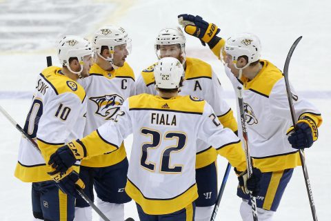  Nashville Predators defenseman Roman Josi (59) celebrates with teammates after scoring a goal against the Washington Capitals in the third period at Capital One Arena. The Predators won 4-3. (Geoff Burke-USA TODAY Sports)