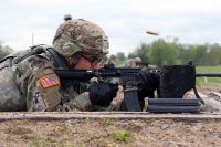 Sgt. Stephen Calderone, a native of Cleveland, Ohio, a Satellite Communications System Operator-Maintainer (25S) from 58 Signal Company, 101st Special Troops Battalion, 101st Airborne Division, shoots pop-up targets during the qualification portion of the 101st’s NCO, Soldier of the Year at Range 9 on Fort Campbell, Ky., April 24. (Sgt. Sharifa Newton, 40th Public Affairs Detachment)