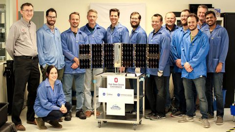 The CubeRRT satellite and Blue Canyon Technologies team members with Principal Investigator Joel Johnson (far left) of The Ohio State University. (Blue Canyon Technologies)