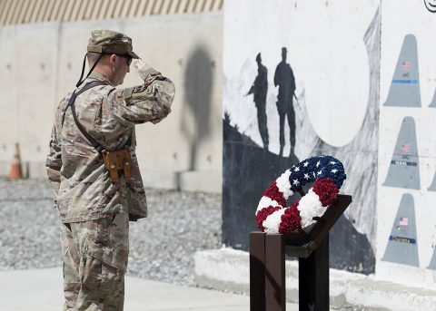 Members of the 438th Air Expeditionary Wing in Kabul, Afghanistan, gather to commemorate Memorial Day May 28, 2018. The day serves to honor military members currently serving and those that have died while in military service. Many Americans observe Memorial Day by visiting cemeteries and memorials with the U.S. flag usually flying at half-staff. (U.S. Air Force photo by Staff Sgt. Jared J. Duhon) 