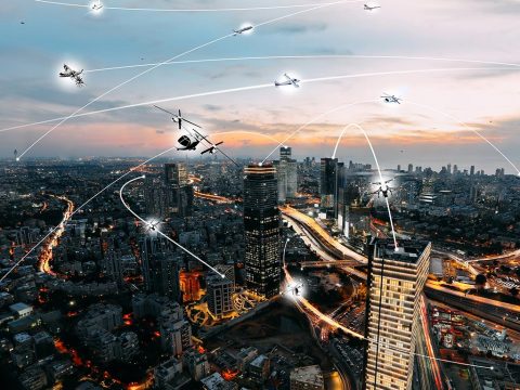 An artist’s conception of an urban air mobility environment, where air vehicles with a variety of missions and with or without pilots, are able to interact safely and efficiently. (NASA / Lillian Gipson)