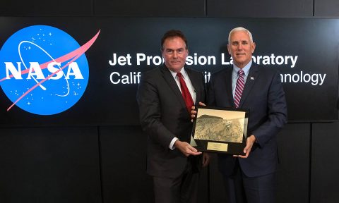 JPL Director Michael Watkins gave Vice President Mike Pence, right, a plaque during the Vice President's tour of JPL on April 28, 2018. The plaque features a view of NASA's Curiosity rover on the surface of Mars. (NASA/Bill Ingalls)