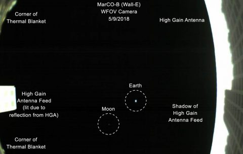 The first image captured by one of NASA's Mars Cube One (MarCO) CubeSats. The image, which shows both the CubeSat's unfolded high-gain antenna at right and the Earth and its moon in the center, was acquired by MarCO-B on May 9. (NASA/JPL-Caltech) The first image captured by one of NASA's Mars Cube One (MarCO) CubeSats. The image, which shows both the CubeSat's unfolded high-gain antenna at right and the Earth and its moon in the center, was acquired by MarCO-B on May 9. (NASA/JPL-Caltech)