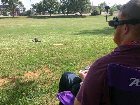 Austin Peay State University Drone Club president Mike Hunter fires up one of the racing drones.