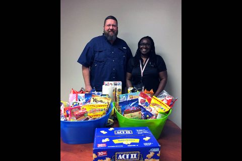 Clarksville Police & Fire Dispatch and Montgomery County 911 deliver gift baskets to Dickson County's Emergency personnel.