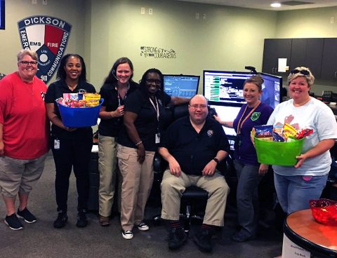 Clarksville Police & Fire Dispatch and Montgomery County 911 deliver gift baskets to Dickson County's Emergency personnel.