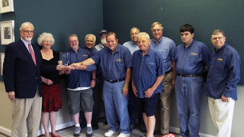 (L) Jim Zimmer, Executive Director; Sue Lewis, Curator of Education. Train Crew, front (L to R): Kenny Hummer; Henry Livingstone; Carl Eiseman. Train Crew, back (L to R): C. David Elliott; Larry Guest; Jeff Stewart; John Blake; Teddy Blake; Randy Spurgeon, Exhibits Preparator.