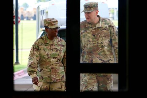 Brig. Gen. Telita Crosland, Regional Health Command-Atlantic commander, arrives at Blanchfield Army Community Hospital, Fort Campbell, Kentucky, June 27, escorted by Lt. Col. James Brown, Blanchfield's deputy commander for clinical services. Crosland assumed command of RHC-A, Army Medicine's largest regional health command, earlier this month and is circulating through the 14 medical treatment facilities and six direct reporting units in the region. (U.S. Army photo by Maria Yager)