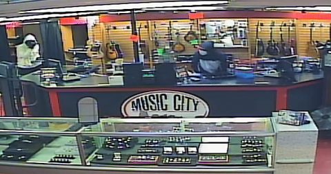 Suspects robbing Music City Pawn in Nashville, TN.