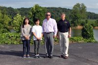 Hanna Kang, manager of Kitchen N Bath, Ann Kim, owner of Kitchen and Bath, Montgomery County Mayor Jim Durrett and Robert Huffman.