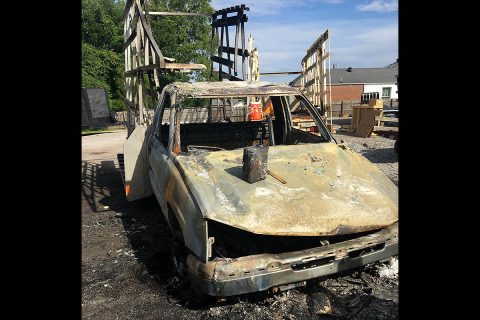 Burglars set fire to a 2007 Chevrolet Silverado at Wall Brothers Glass.