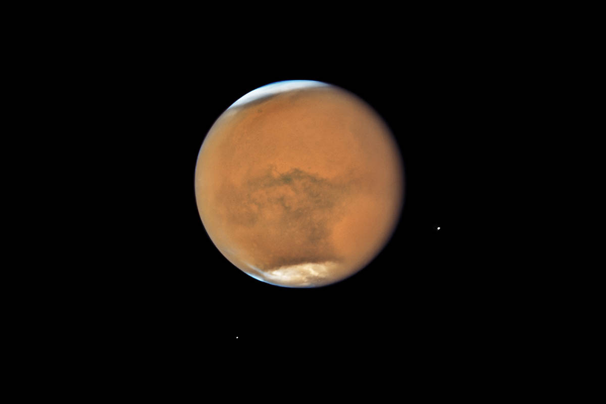 NASA’s Hubble Space Telescope photographed Mars on July 18, near its closest approach to Earth since 2003. The planet was observed near opposition, when the Sun, Earth and Mars are lined up, with Earth sitting in between the Sun and Mars. This proximity gives the Red Planet its brightest appearance in the night sky since the 2003 opposition. (NASA, ESA, and STScI)
