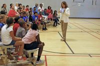 Tennessee First Lady Crissy Haslam describes one of the books given away at the kick-off event for Read20 Book Patrol at the Kleeman Community Center July 9th, 2018. Read20 Book Patrol encourages children to read at least 20 minutes a day, while partnering with law enforcement to build positive relationships with officers in Tennessee communities.