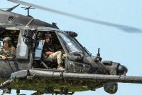 Secretary of the Army Dr. Mark T. Esper flies with 160th Special Operations Aviation Regiment, in a UH60 Blawkhawk, overtop Fort Campbell, Ky training areas on July 10th, 2018. The Secretary visited Fort Campbell on Tuesday to see the 101st Airborne Division’s unique capabilities and the readiness of the division. (Sgt. Patrick Kirby, 40th Public Affairs Detachment)