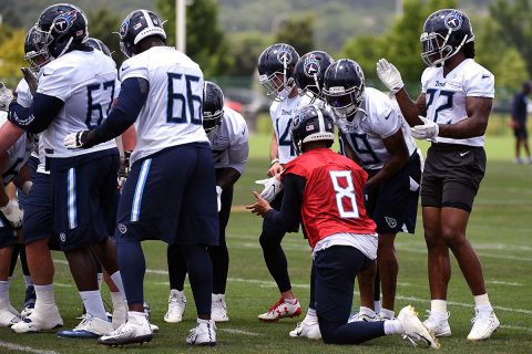 Tennessee Titans quarterback Marcus Mariota (8) talks in a huddle during minicamp at Saint Thomas Sports Park. (Christopher Hanewinckel-USA TODAY Sports)