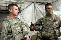 Col. John P. Cogbill, right, and Brig. Gen. K. Todd Royar, 101st Airborne Division deputy commanding general (Support), discuss 3rd BCT training inside the brigade tactical operations center in May. Hands-on training like this helps reinforce classroom instruction and encourages adaptive thinking, the author argues. (U.S. Army photo by Staff Sgt. Cody Harding, 3-101)