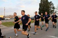 Col. John P. Cogbill, second from left, conducts physical training with Royar, left, and officers of the 3rd BCT. All types of training, education and creative challenges encourage an innovation culture that will help the Army in the future. (Staff Sgt. Cody Harding, 3-101)