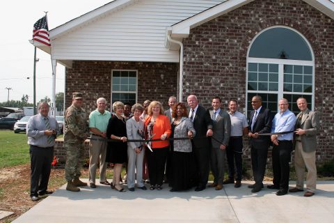 Clarksville Mayor Kim McMillan, Buffalo Valley Inc. CEO Jerry Risner, THDA Liaison Denise McBride and other dignitaries joined Monday to cut the ribbon on new affordable housing for veterans at Providence Pointe subdivision in Clarksville.