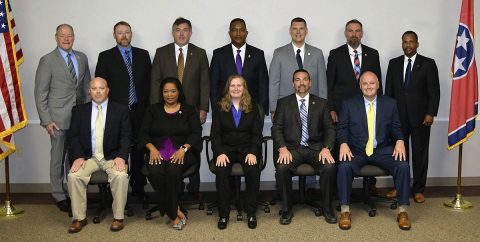 (Back row, L to R) TBI Director David Rausch, Tony Hall – Rutherford County Sheriff’s Office, Mark Lewis – TBI, Terry Reed – TBI, Brian Crews – Shelbyville Police Department, Jim Williams – TBI, TBI Training Assistant Director Richard Moore. (Front row, L to R) Gary Bean – Morristown Police Department, Donna Nelson – TBI, Tara Beauchamp – UT Martin Department of Public Safety, Josh Savley - TBI, Christopher Golden – Bartlett Police Department.