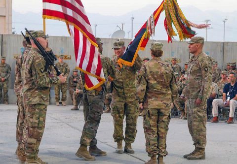 Command Sgt. Maj. Anthony McAdoo passes the Brigade guidon to the outgoing Brigade Commander Colonel Stanley J. Sliwinski during a change of command ceremony at Bagram Airfield, Afghanistan, Aug. 26. The change of command ceremony represents the transfer of responsibility and authority from the outgoing commander, Col. Stanley J. Sliwinski to Col. Stephanie A. Barton. (Staff Sgt. Caitlyn Byrne Public Affairs) Command Sgt. Maj. Anthony McAdoo passes the Brigade guidon to the outgoing Brigade Commander Colonel Stanley J. Sliwinski during a change of command ceremony at Bagram Airfield, Afghanistan, Aug. 26. The change of command ceremony represents the transfer of responsibility and authority from the outgoing commander, Col. Stanley J. Sliwinski to Col. Stephanie A. Barton. (Staff Sgt. Caitlyn Byrne Public Affairs)