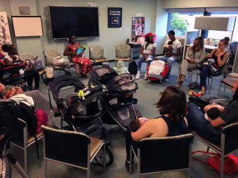 New mothers, from left to right, Spc. Sandra Keys, Spc. Connie Ramirez, Army spouse Melissa Wickland and Spc. Alaycia Pagan-Rivera, all Centering Pregnancy participants at Blanchfield Army Community Hospital, returned to BACH for a postpartum Centering Pregnancy reunion Sept. 6. The women shared their pregnancy journeys together in the hospital's Centering Pregnancy program and reunited to show off their babies and share their birth stories. Centering Pregnancy is an alternative prenatal care method offered at select Army hospitals and medical centers. (U.S. Army photo by Maria Yager)