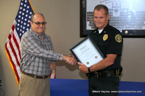 Clarksville Police Lt. Steve Warren receiving his Certificate of Retirement from Chief Al Ansley.