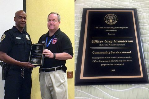 Clarksville Police Officer Greg Granderson receiving Community Service Award.