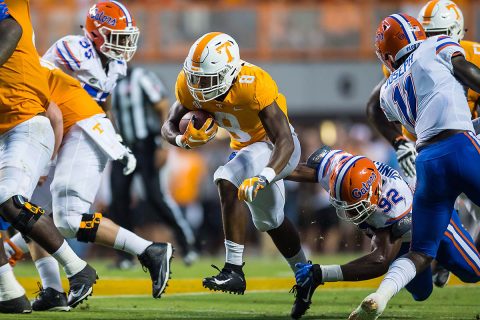 Tennessee Volunteers running back Ty Chandler (8) runs past Florida Gators defensive lineman Jabari Zuniga (92) in the first half of a game at Neyland Stadium. Bryan Lynn-USA TODAY Sports)