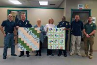 (L to R) Officer Westover, Officer Koziol, Eunice Conley, Donna Miller,  Lt Filmore, Detective Honholt, Detective Neagos. (Jim Knoll, CPD)