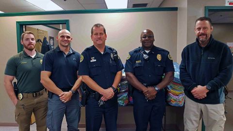 (L to R) Detective Neagos, Officer Westover, Officer Koziol, Lt Filmore, Detective Honholt. (Jim Knoll, CPD)