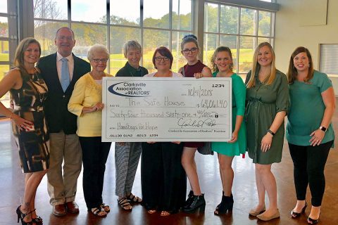 Clarksville Association of Realtors® Young Professionals Network Presents check to SafeHouse. Clarksville Association of Realtors® Young Professionals Network Presents check to SafeHouse.