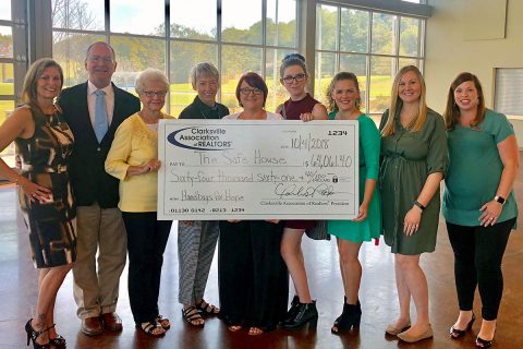 Clarksville Association of Realtors® Young Professionals Network Presents check to SafeHouse.