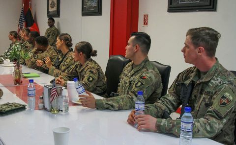 Junior Leadership Course candidates sit attentively during the JLC awards dinner, which signified the completion of the course, in the Dragon Dining Facility on Bagram Airfield, Afghanistan, Sept. 29, 2018. (SSG Caitlyn Byrne, 101st Sustainment Brigade PAO) 