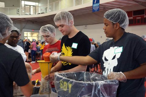 Austin Peay State University students pack meals during the Freshman Service Project.