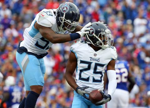 Tennessee Titans linebacker Daren Bates (53) reacts after an interception by cornerback Adoree' Jackson (25) against the Buffalo Bills during the fourth quarter at New Era Field. (Rich Barnes-USA TODAY Sports)