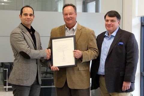 Florim USA CEO Marco Fregni (left) and Florim USA Environmental Manager Don Haynes (right) receive the 2017 Tennessee Valley Authority Carbon Reduction Award from Cumberland Electric Membership Corporation General Manager Chris A. Davis (center).