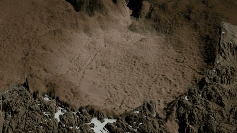 Views of the Hiawatha crater region showing the topography of the rock beneath the ice sheet, including the crater. (NASA/Cindy Starr)