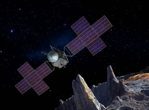 This artist's concept depicts the spacecraft of NASA's Psyche mission near the mission's target, the metal asteroid Psyche. (NASA/JPL-Caltech/Arizona State Univ./Space Systems Loral/Peter Rubin)