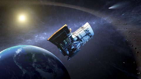 This artist's concept shows the Wide-field Infrared Survey Explorer, or WISE, spacecraft, in its orbit around Earth. In its NEOWISE mission it finds and characterizes asteroids. (NASA/JPL-Caltech)